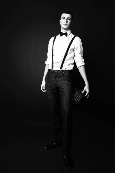 Fashion photo of young model man on black background. Boy posing. Studio photo. Black and white — Stock Photo, Image