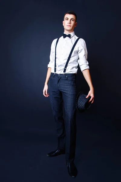 Fashion photo of young model man on black background. Boy posing. Studio photo. — Stock Photo, Image