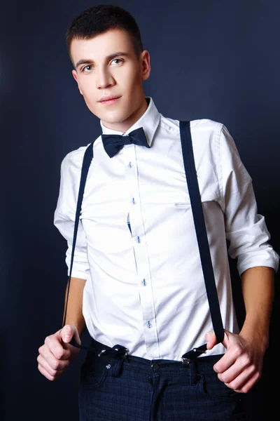 Fashion photo of young model man on black background. Boy posing. Studio photo. — Stock Photo, Image
