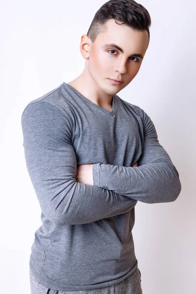 Fashion photo of young model man on white background. Boy posing. Sports guy. Studio photo. — Stock Photo, Image