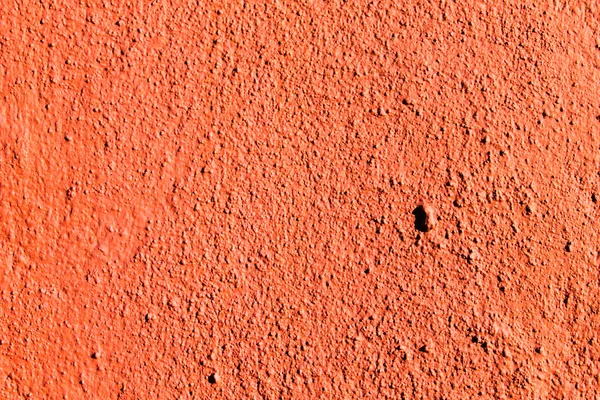 Gestuukte muur Detail in het rood — Stockfoto