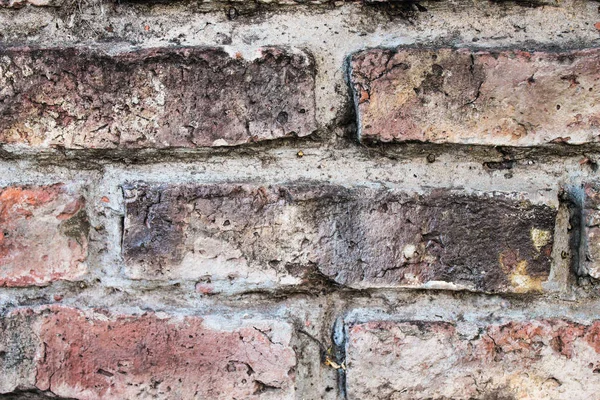Parede de tijolo e concreto enferrujado — Fotografia de Stock