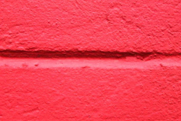 Штукатурная стена в красном — стоковое фото