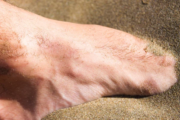 Fuß im Sand Detail — Stockfoto