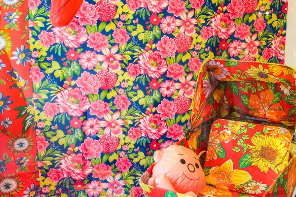 Plastic Toys in a Flower Cloth Pattern