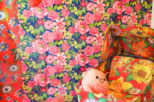 Plastic Toys in a Flower Cloth Pattern