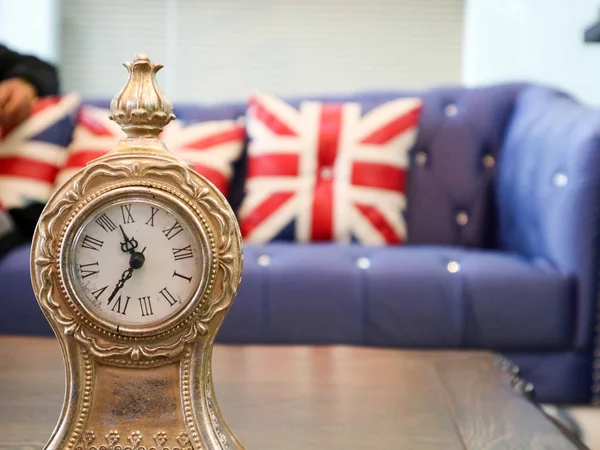 close up to table clock vintage style in living room for break t