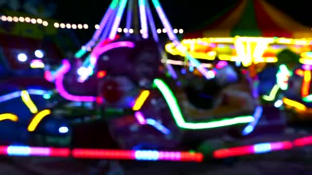 Blur Carousel rolling neon light in the night market fair2 — Stock Video