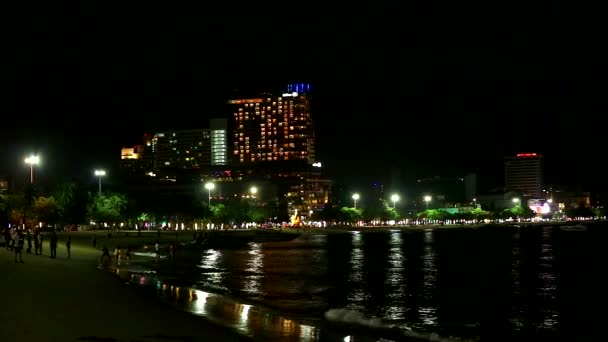 Chonburi Thailand, 2019 October 01, time lapse night sea at pattaya beach and speed boat parking in gulf — стокове відео