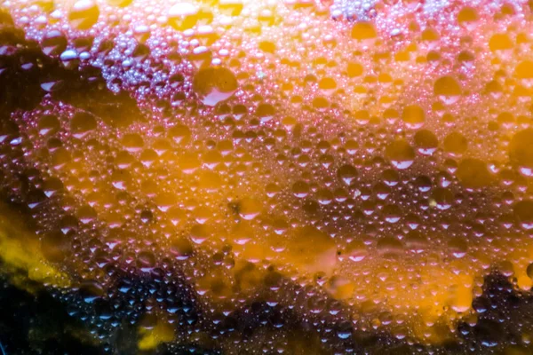 Borrosa rojo anaranjado amarillo de oscuro y sombra de la superficie de aceite espalda —  Fotos de Stock