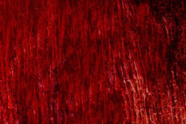 Lav granit duvar örtüsü yüzeyi. İç kısmı koyu kırmızı sıcak ton C için.