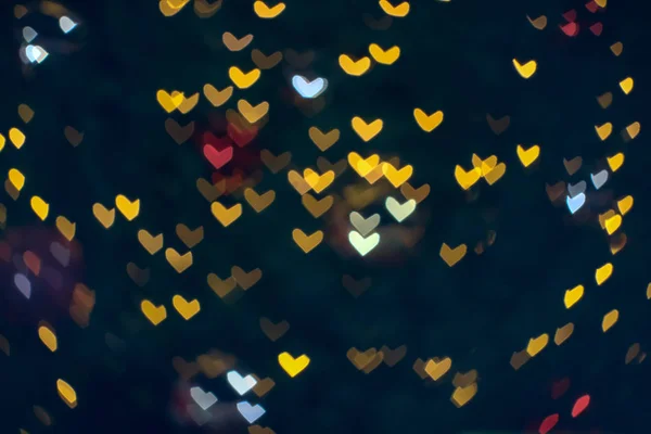 Bokeh форме сердца любовь Валентина красочный ночной свет в магазине пин — стоковое фото