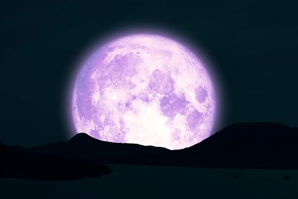 Full Snow Moon on night sky back silhouette island in the ocean — 스톡 사진