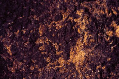 İç duvar kâğıdı ve arka plan için mağaranın eski mor granit taş yüzeyi