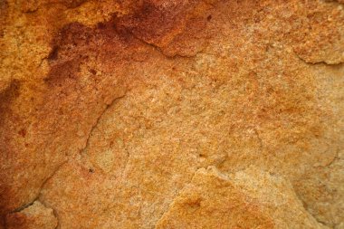 İç duvar kağıdı ve arka plan için mağaranın ağır sert granit kum taşı yüzeyi