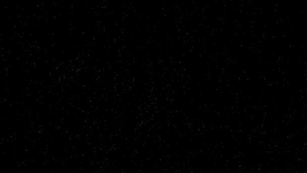 Laranja branco desbotar cair e flutuante e pequena estrela amarela na tela preta — Vídeo de Stock