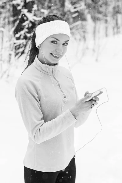 woman listening to music and jogging