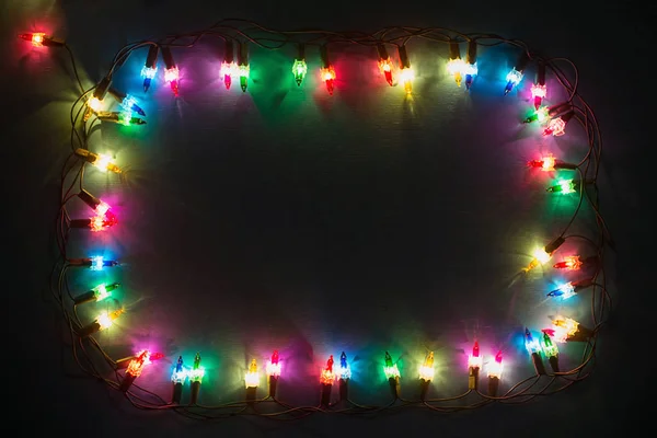 Luzes guirlanda fundo colorido — Fotografia de Stock