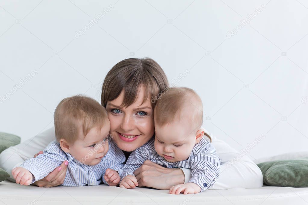 Mother holding twins