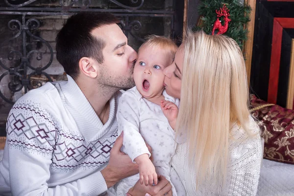 parents kissing cute funny child