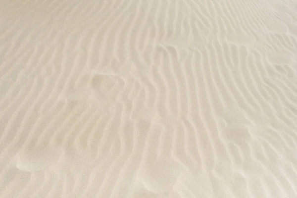 Closeup της άμμου μοτίβο μιας παραλίας το καλοκαίρι — Φωτογραφία Αρχείου