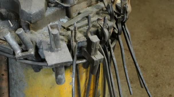 Metal tools in the blacksmith shop ready to work. — Stock Video