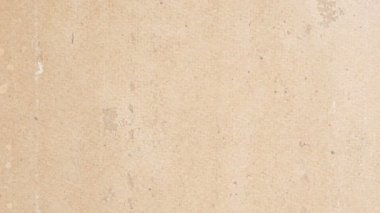 Dokulu kahverengi beton duvar.