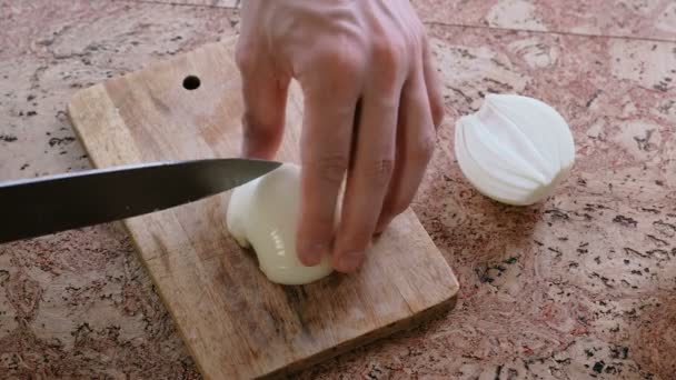 Man cant cut a bow, he freaks out and throws a knife on the board. Close-up of mans hands. — Stock Video