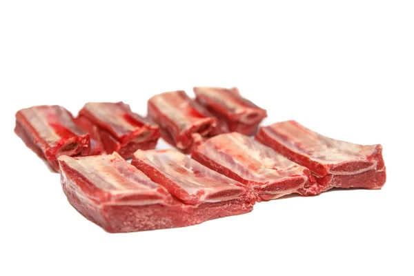 Ribs raw beef sliced to pieces. Insulated. — Stock Photo, Image