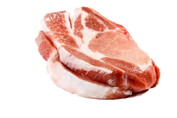 Lombo de porco sem osso fatiado é sobre um fundo branco . — Fotografia de Stock