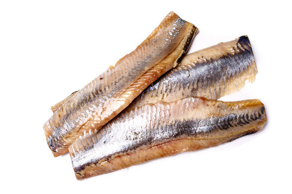 Fillet, back of the herring lies on a white background. Not isol