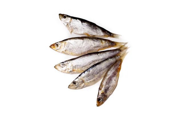 Azowskiego szprota (whitebait) są małe ryby solone leży na białym — Zdjęcie stockowe