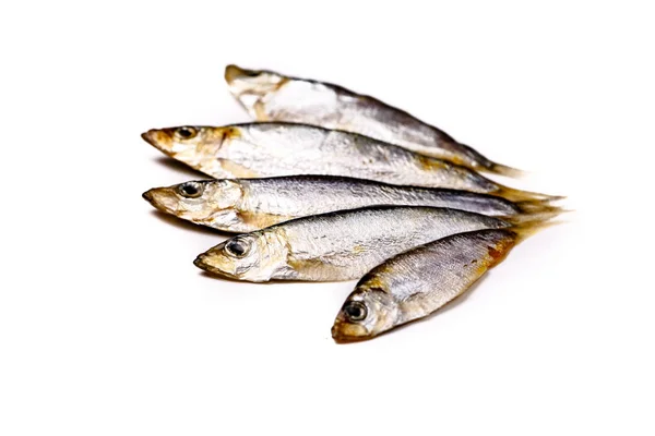 Азовский шпрот (приманка) - мелкая рыбная соленая ложь на белом — стоковое фото