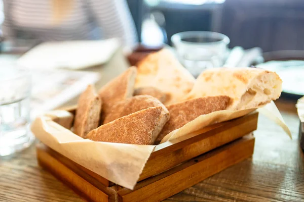 The basket of bread. Pellets from wheat flour. — Stock Photo, Image