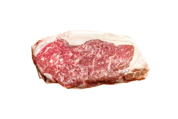 Surový ribeye steak ležící na stole. — Stock fotografie