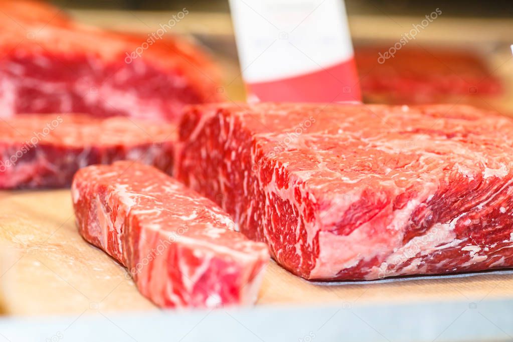 Marble beef steak strip loin is on the counter