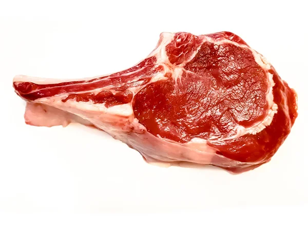 RIB eye på ben eller cowboy biff av nöt eller kalv på en vit b — Stockfoto