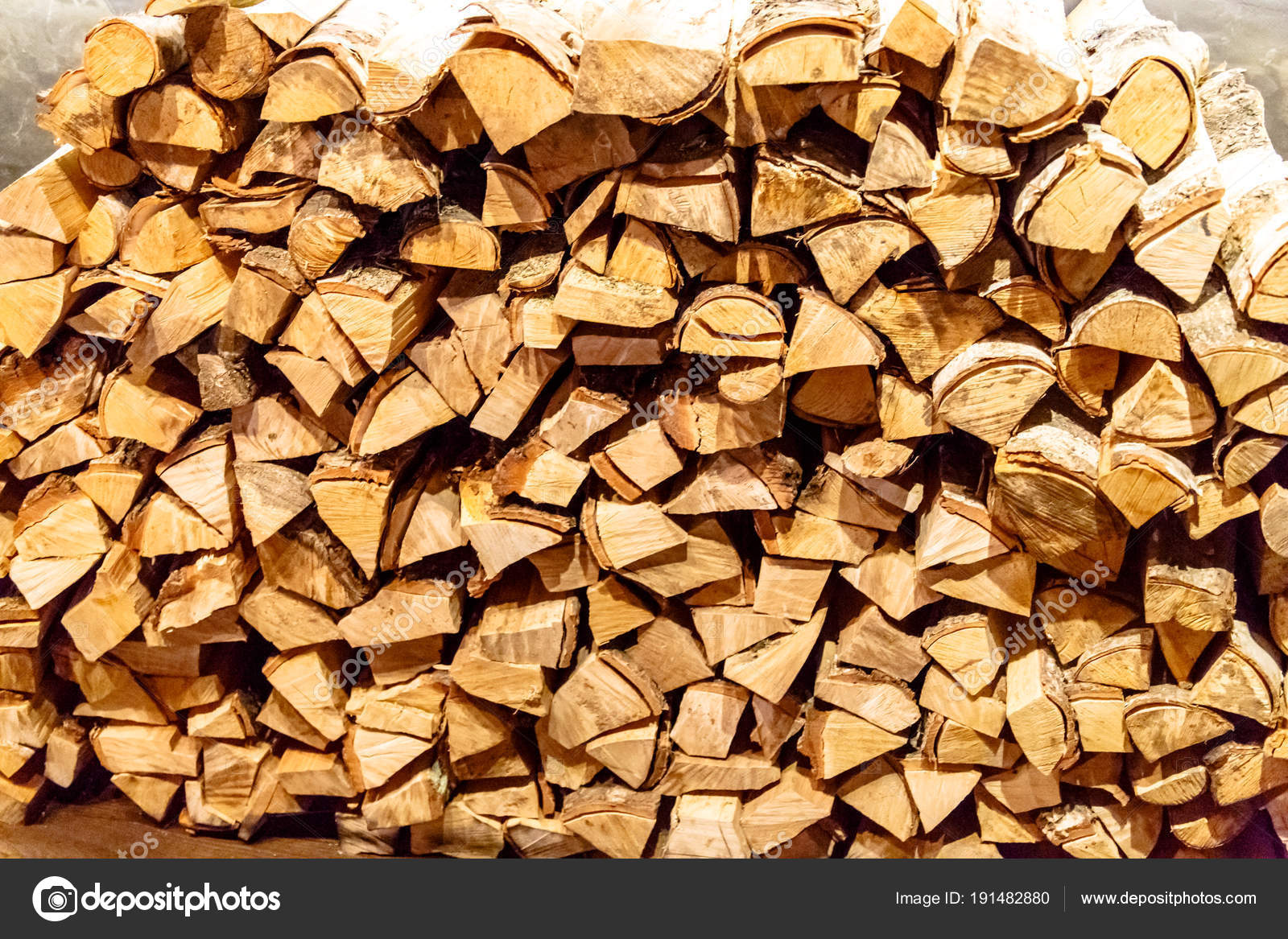 Birch Logs For The Fireplace Are Stacked Against The Wall Stock