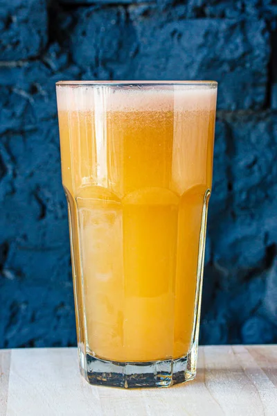 Yellow Smoothie Orange Mandarin Large Glass Cup Dark Wall — Stock Photo, Image