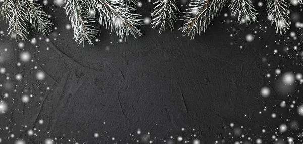 Xmas Theme Fir Branches Globes Snowy Black Stone Background Viewed — Stock Photo, Image