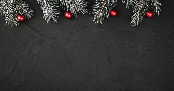 Xmas Theme Fir Branches Globes Black Stone Background Viewed Greeting — Stock Photo, Image