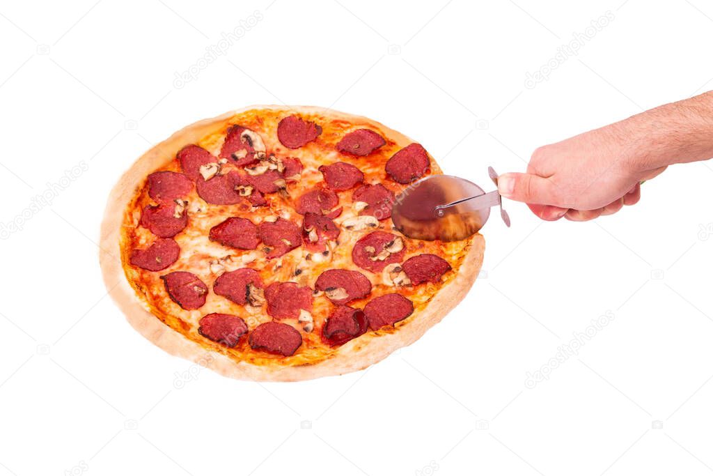 Salami pizza with mushrooms, hand cutting pizza, top view, isolated on white