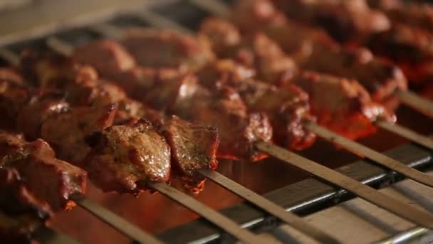 Cook roasts juicy kebab barbecue with crispy grilled slowmotion — Stock Video