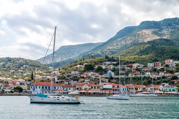 Town Vathy, Ithaka, Ionian islands, Greece, august 23, 2017: Yacht near Town Vathy, Ithaka island, Greece