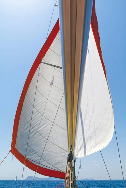 Big White Orange Sails Sailing Boat Raising Blue Clear Sky — Stock Photo, Image