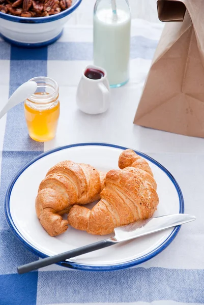 Continental breakfast - croissant — Stock Photo, Image