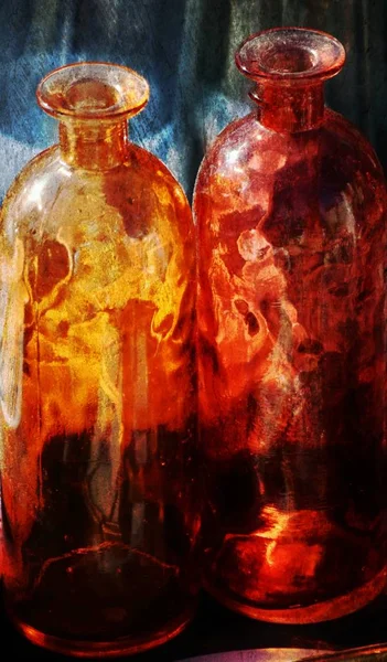 Alte orange Glasflaschen — Stockfoto