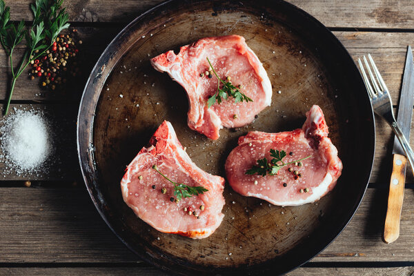 Raw meat on the vintage table