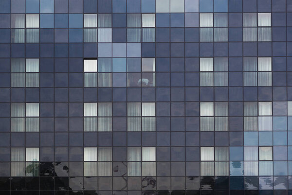 Contemporary facade texture of glasses tiles. Scyscraper