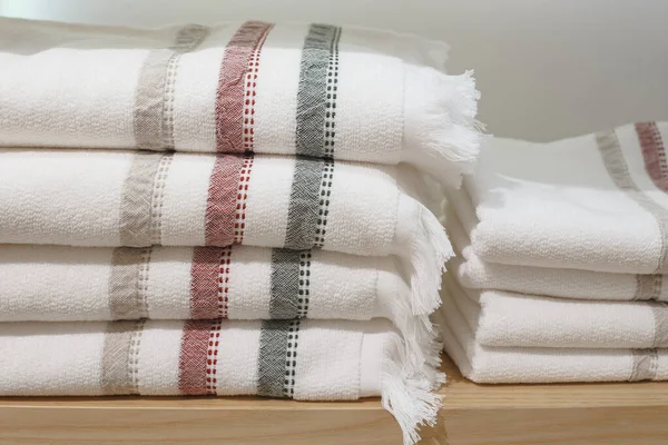 Shelves with towels stacks in shop. Hygge or another scandinavian style. — ストック写真